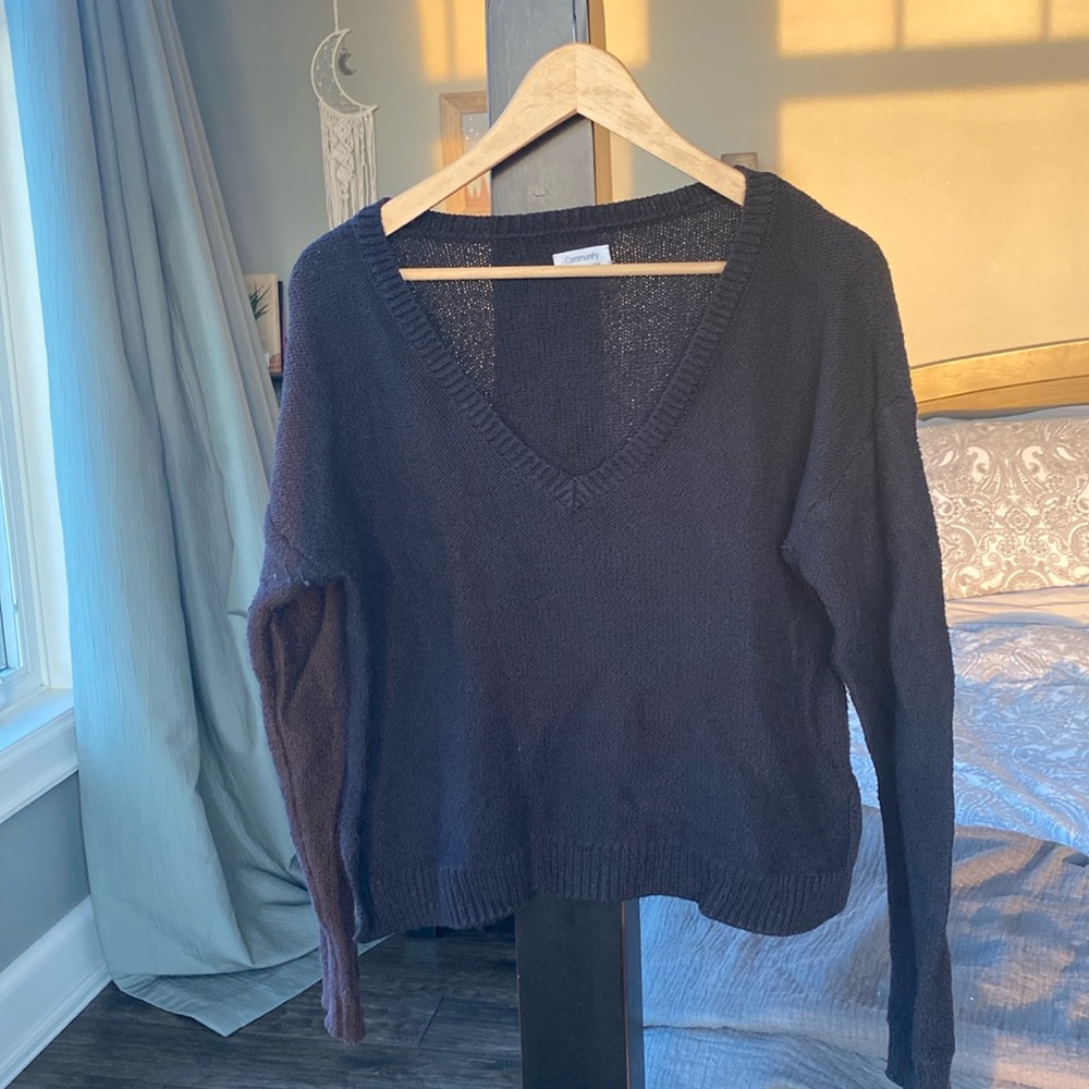 Very cozy black community knit sweater